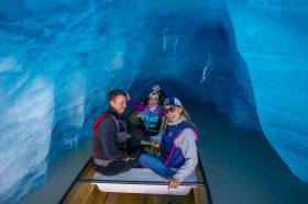 Canoeing inside an ice cave.